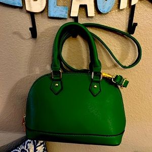 This purse is bold and beautiful. It is lightweight for those who hate clutter.